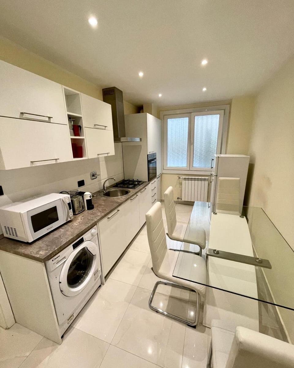 Kitchen or kitchenette, Dining area, dishwasher, oven, stove, toaster, washing machine