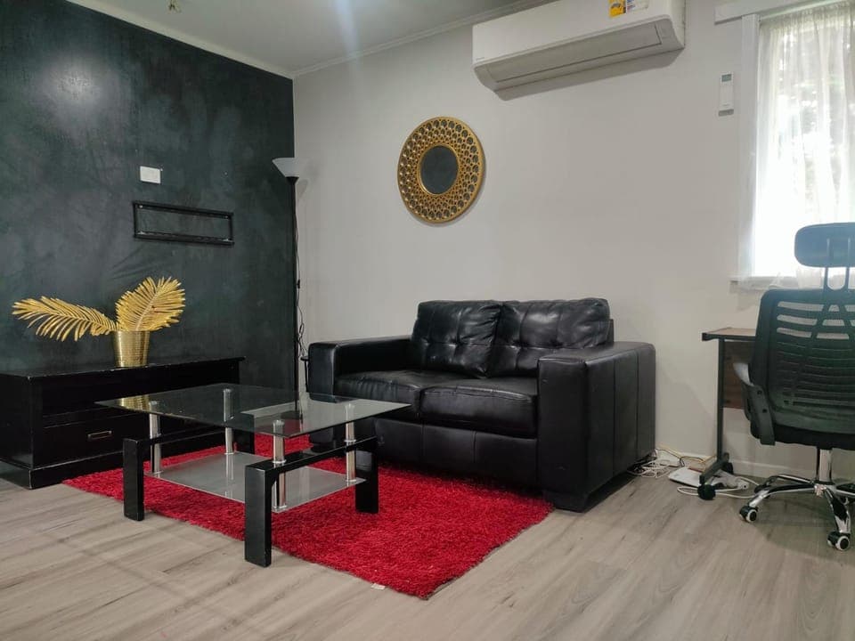 Communal lounge/ TV room, Living room, Seating area, air conditioner