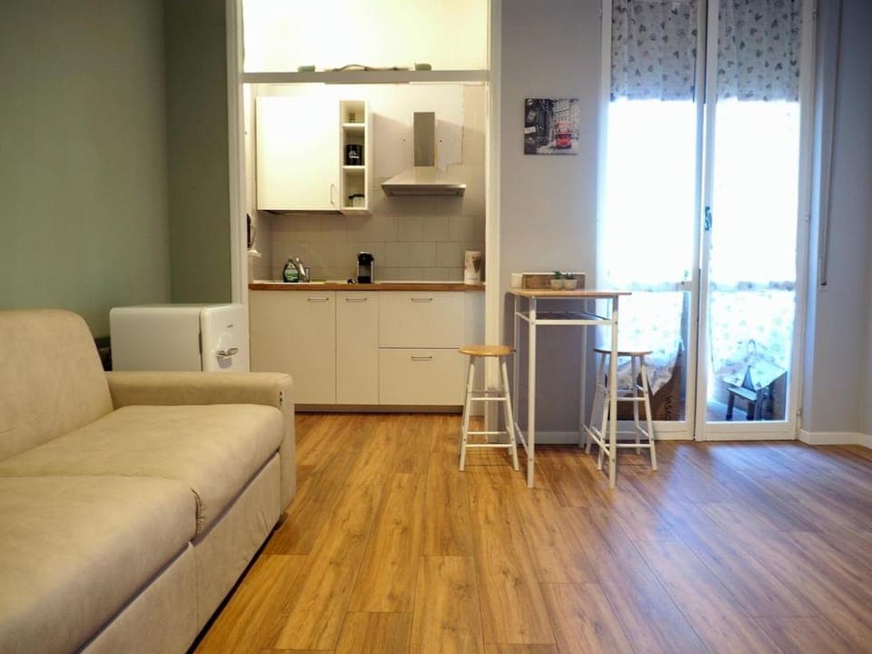 Kitchen or kitchenette, Living room, Seating area, Dining area