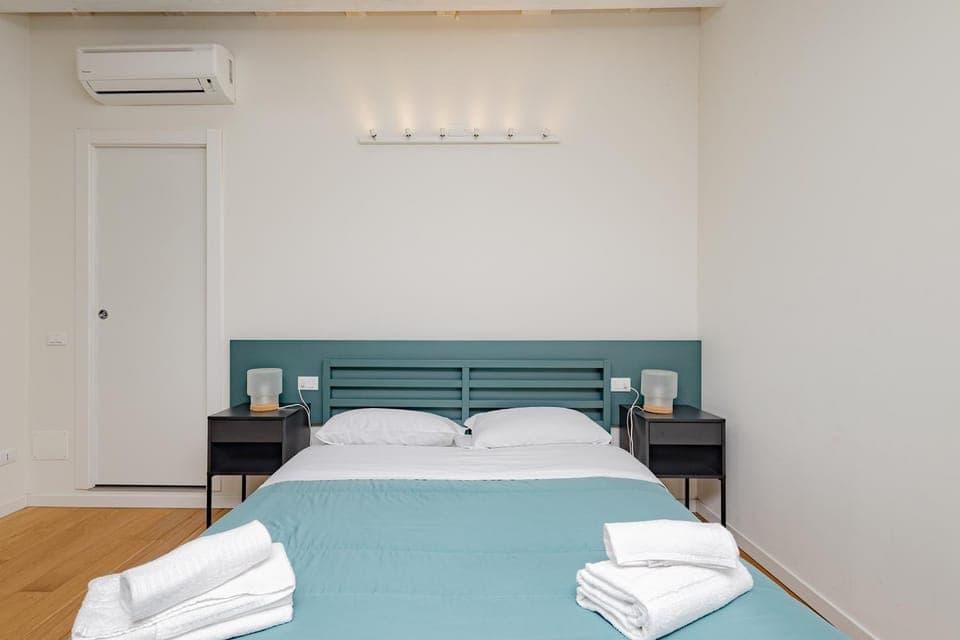 Bed, Photo of the whole room, Bedroom, towels, air conditioner