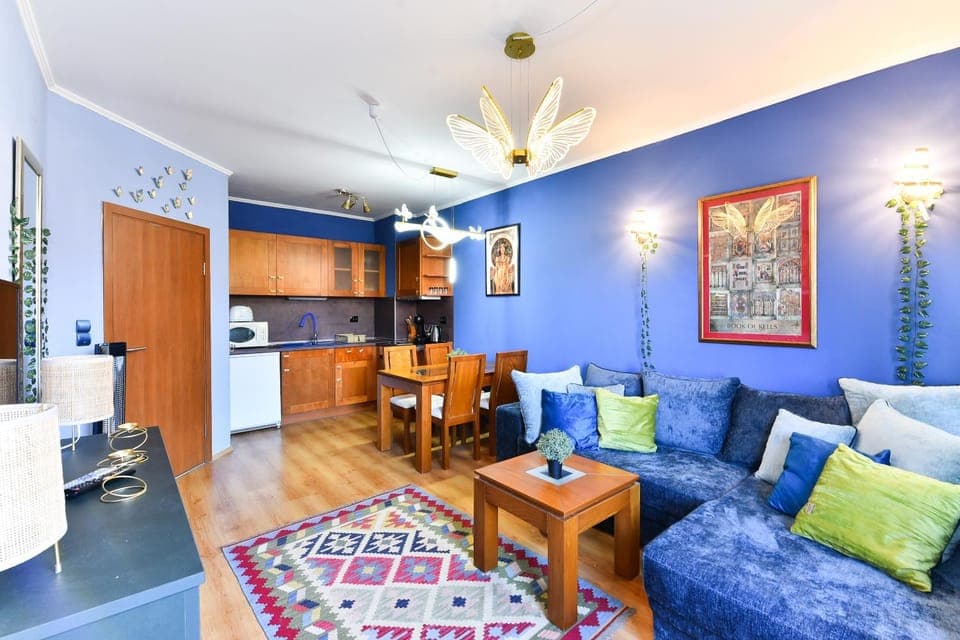 Living room, Dining area, microwave, oven, stove, toaster, kitchen