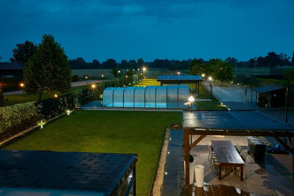 Property building, Patio, Night, Garden, Garden view, Pool view, Swimming pool