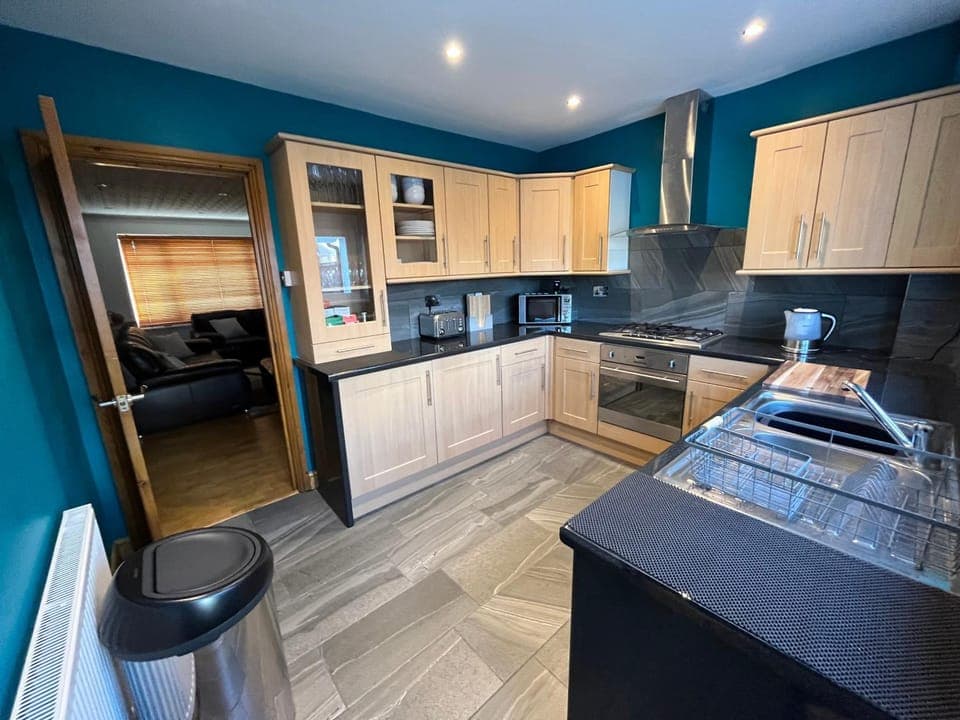 Kitchen or kitchenette, oven, toaster