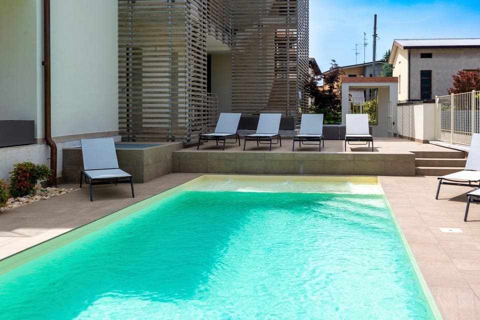 Property building, Pool view, Swimming pool, sunbed