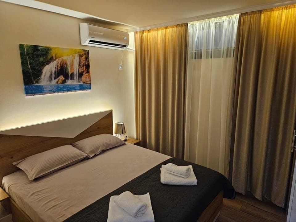 Bed, Photo of the whole room, Bedroom, towels, air conditioner