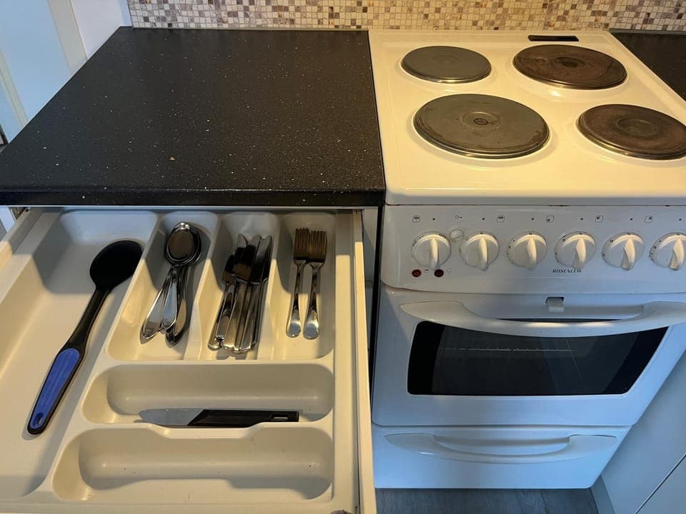 Kitchen or kitchenette, stove, kitchen