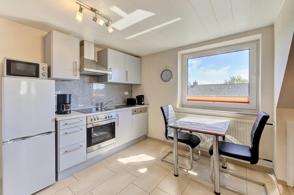 Kitchen or kitchenette, Dining area, dishwasher, oven, stove, toaster