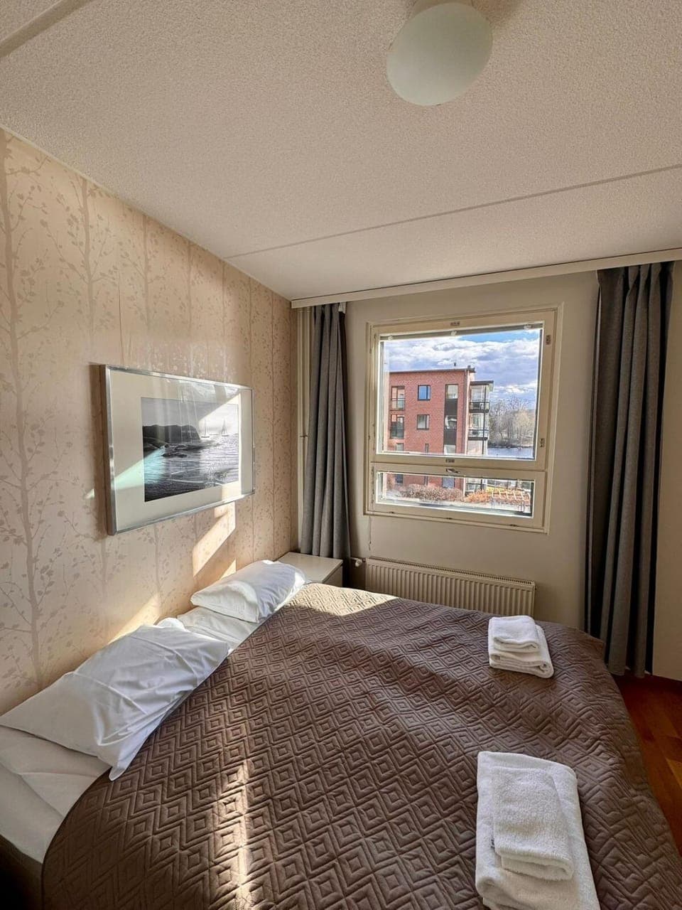 Kotimaailma Apartments - saunallinen kaksio koskinäkymällä - Verstaankatu Apartment in Finland