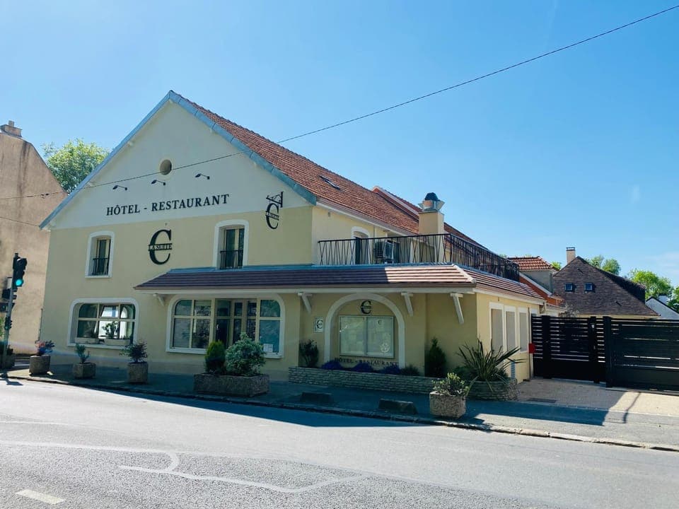 Property building, Day, Property logo or sign, Property logo or sign