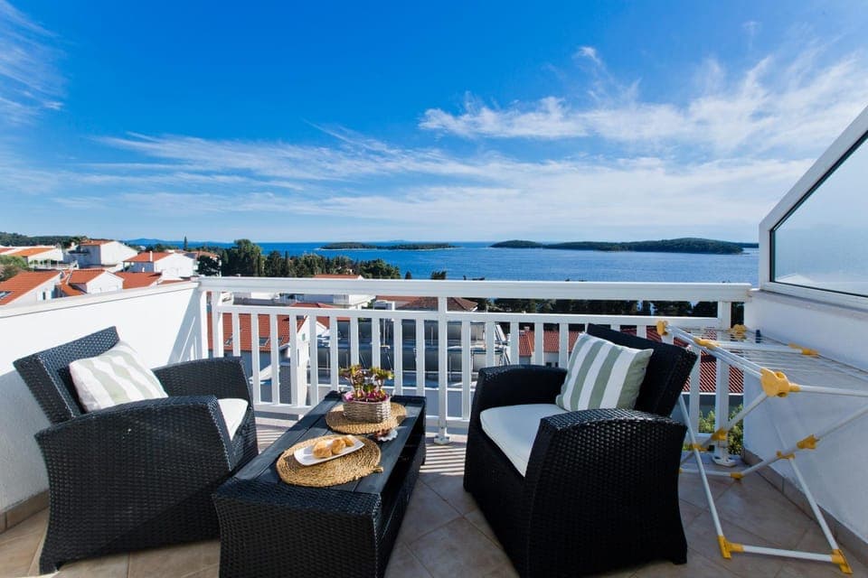 View (from property/room), Balcony/Terrace, Seating area, Beach, Sea view