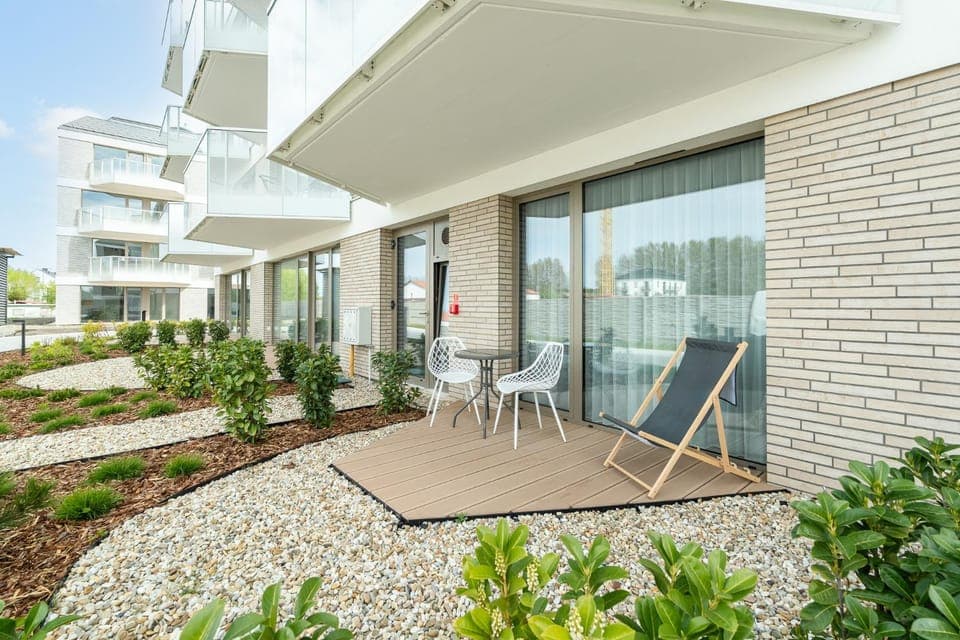 Property building, Patio, Spring, Day, Garden, View (from property/room), Balcony/Terrace, Garden view, sunbed