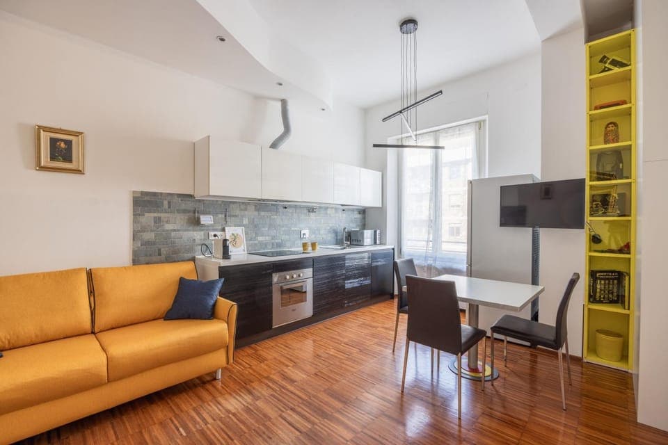 TV and multimedia, Kitchen or kitchenette, Living room, Seating area, Dining area, oven, stove, air conditioner