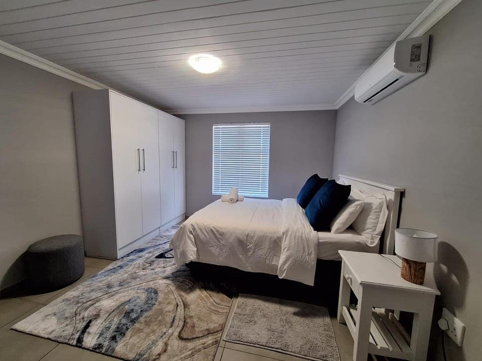 Bed, Photo of the whole room, Bedroom, towels, air conditioner