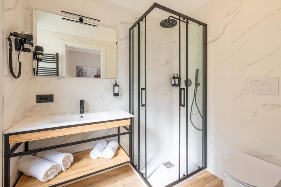 Shower, Bathroom, furniture, hair dryier, towels