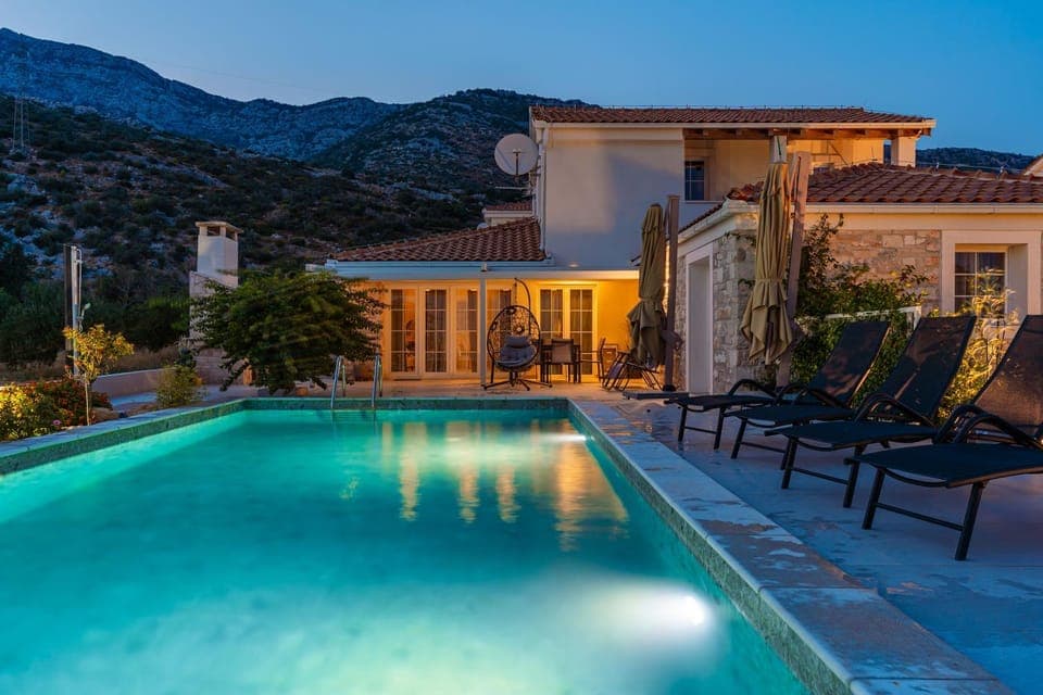 Property building, Patio, Night, Natural landscape, Mountain view, Pool view, Swimming pool, sunbed