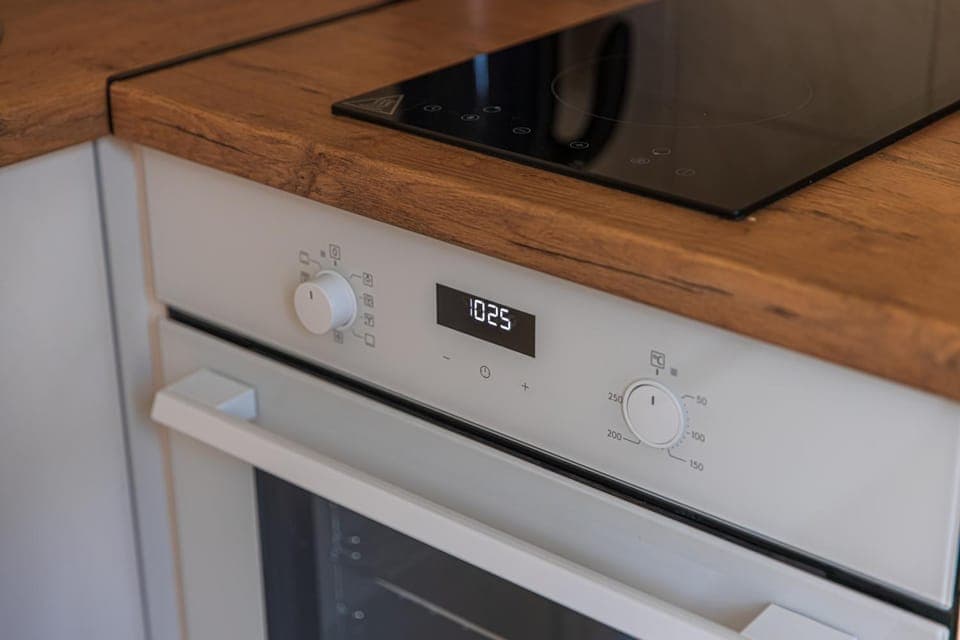 Kitchen or kitchenette, oven, stove