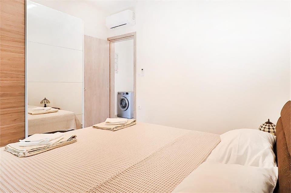 Bed, Photo of the whole room, Bedroom, towels, air conditioner