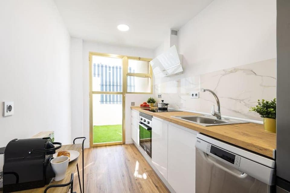 Kitchen or kitchenette, dishwasher, oven, stove, toaster