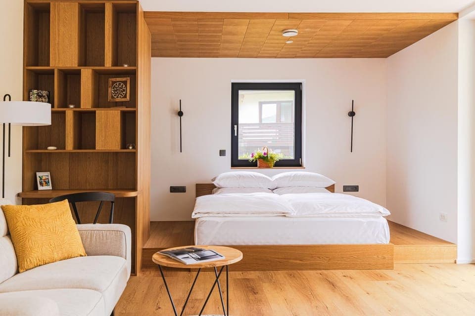 Bed, View (from property/room), Living room, Seating area, Bedroom