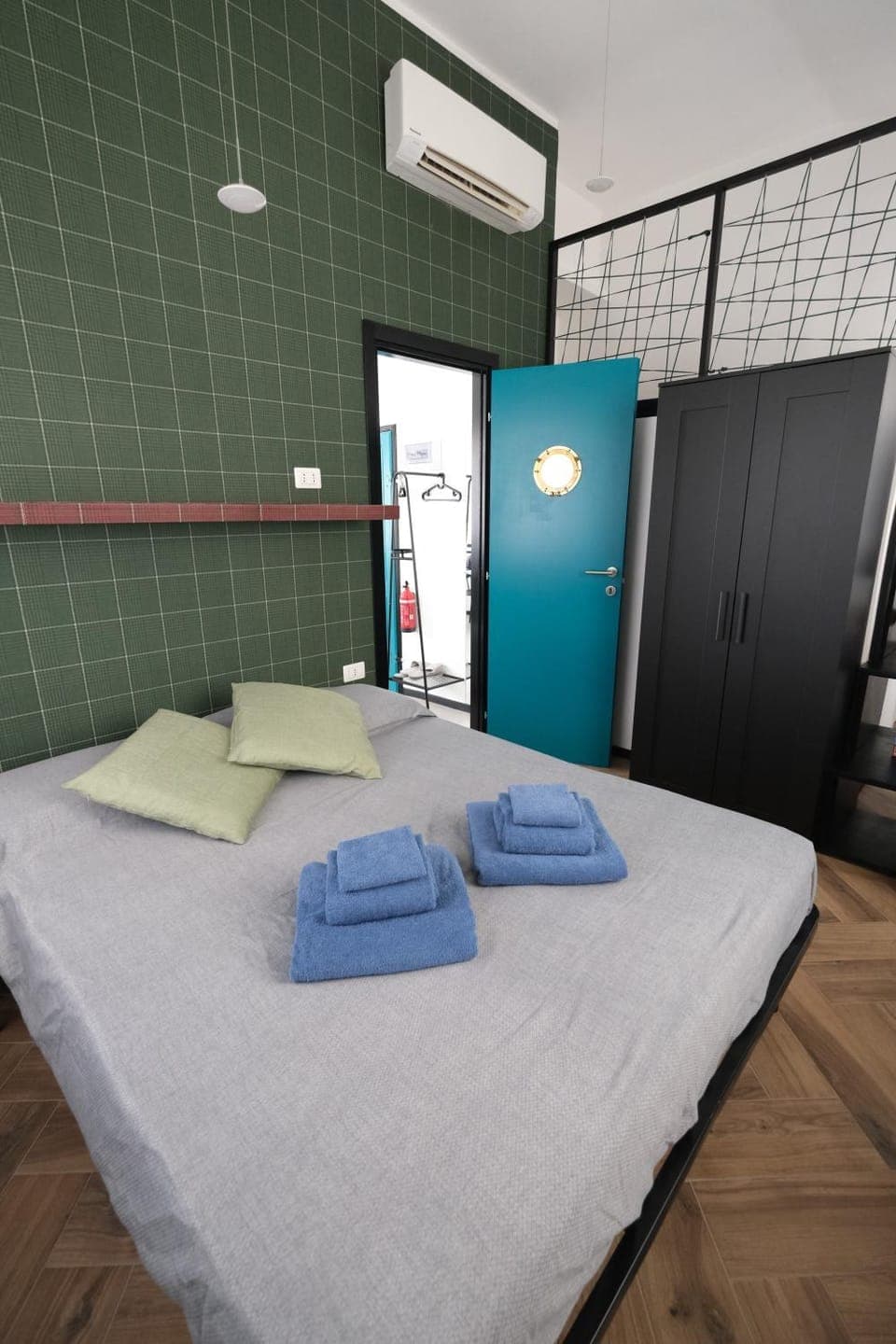 Bed, Photo of the whole room, Bedroom, towels, air conditioner