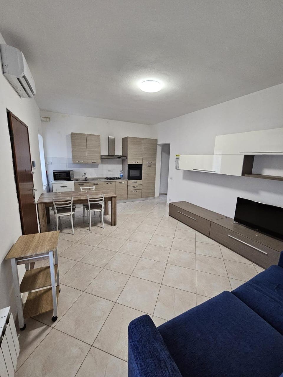 Living room, Seating area, Dining area, stove, air conditioner