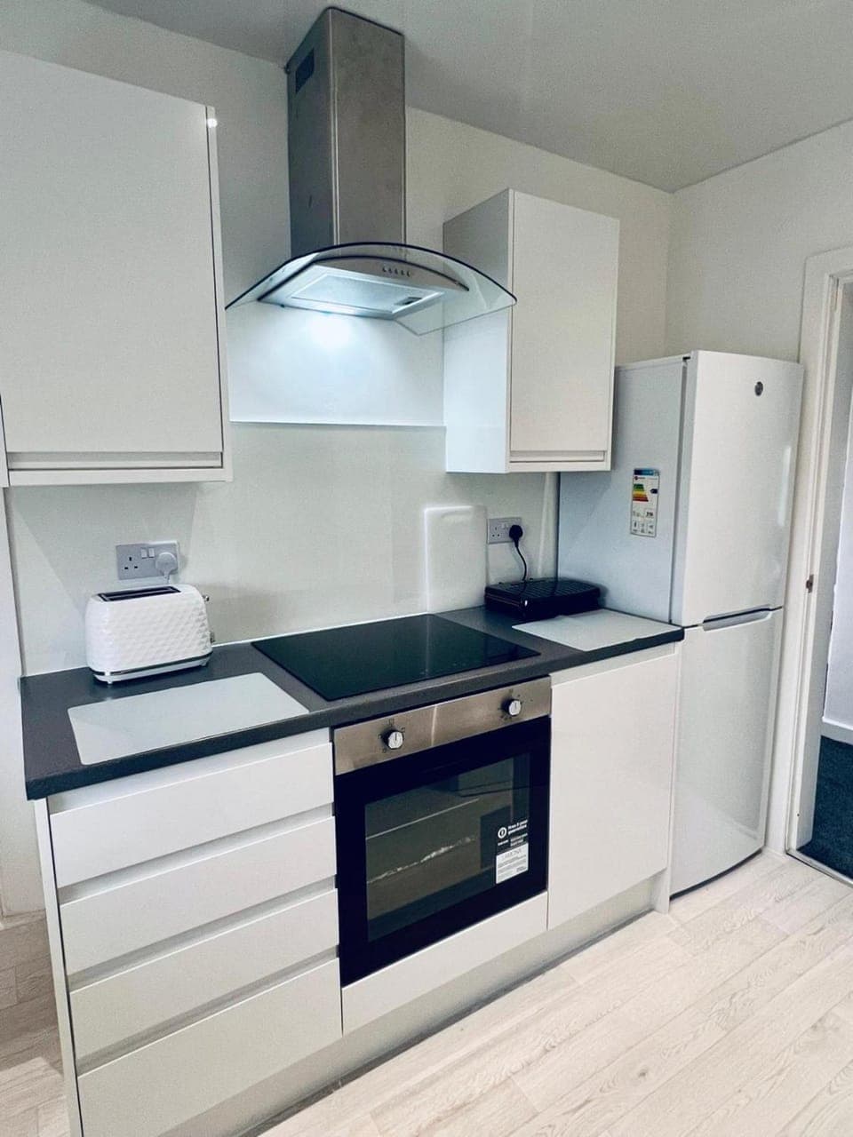 Kitchen or kitchenette, oven