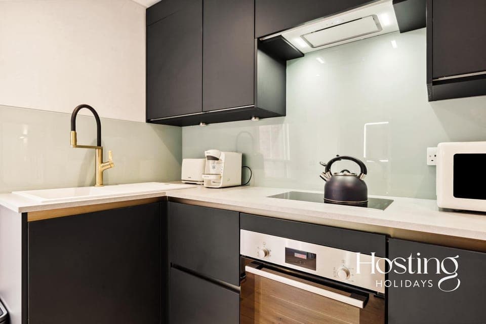 Kitchen or kitchenette, oven, stove