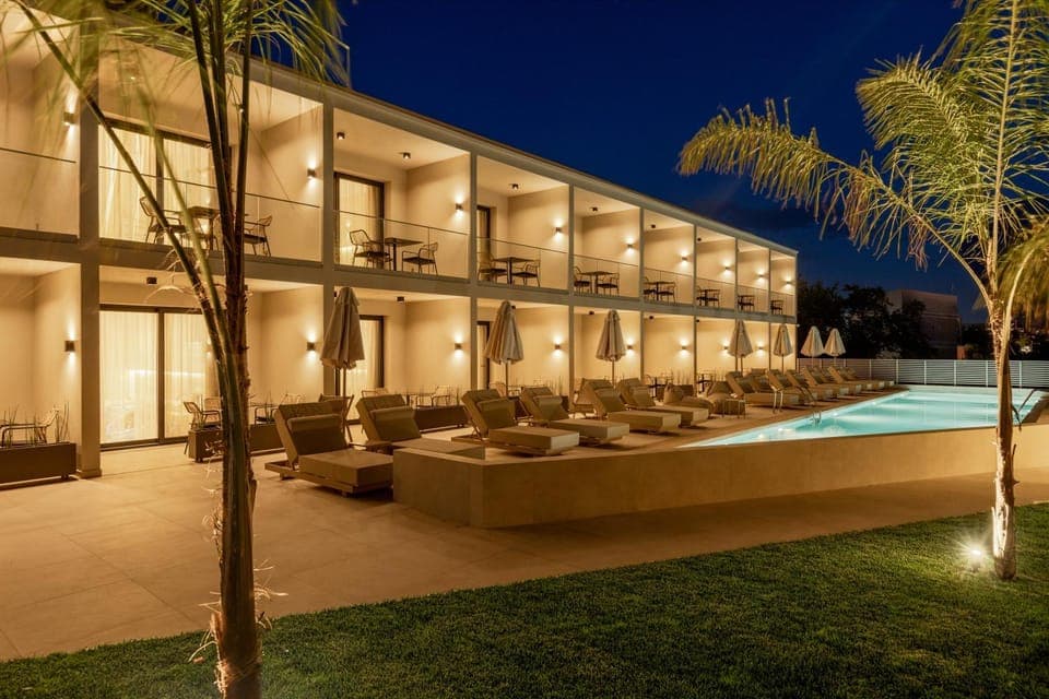 Property building, Patio, Pool view, Swimming pool, sunbed