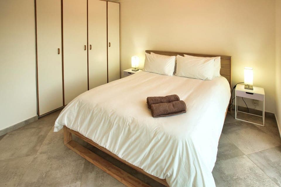 Bed, Photo of the whole room, towels, wardrobe