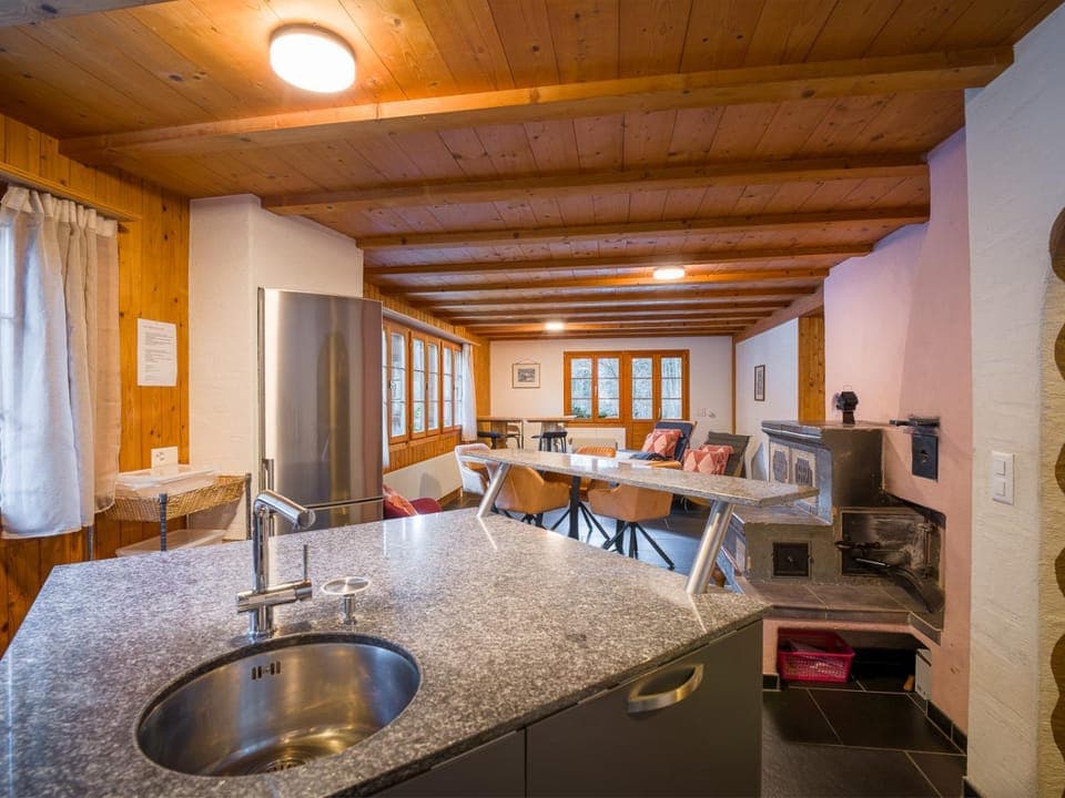 Kitchen or kitchenette, Living room, Seating area, Dining area