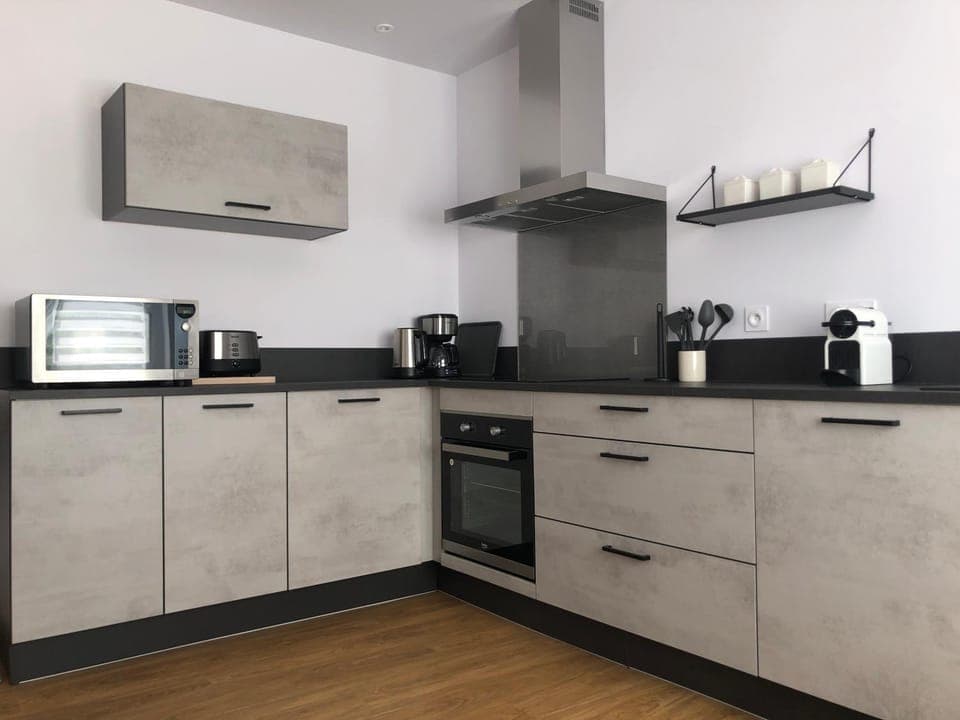 Kitchen or kitchenette, dishwasher, oven, stove, toaster