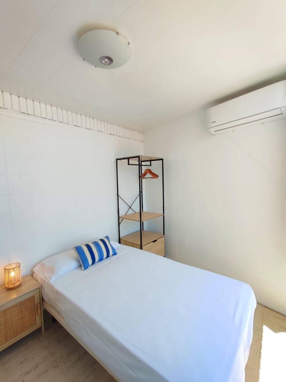 Bed, wardrobe, air conditioner