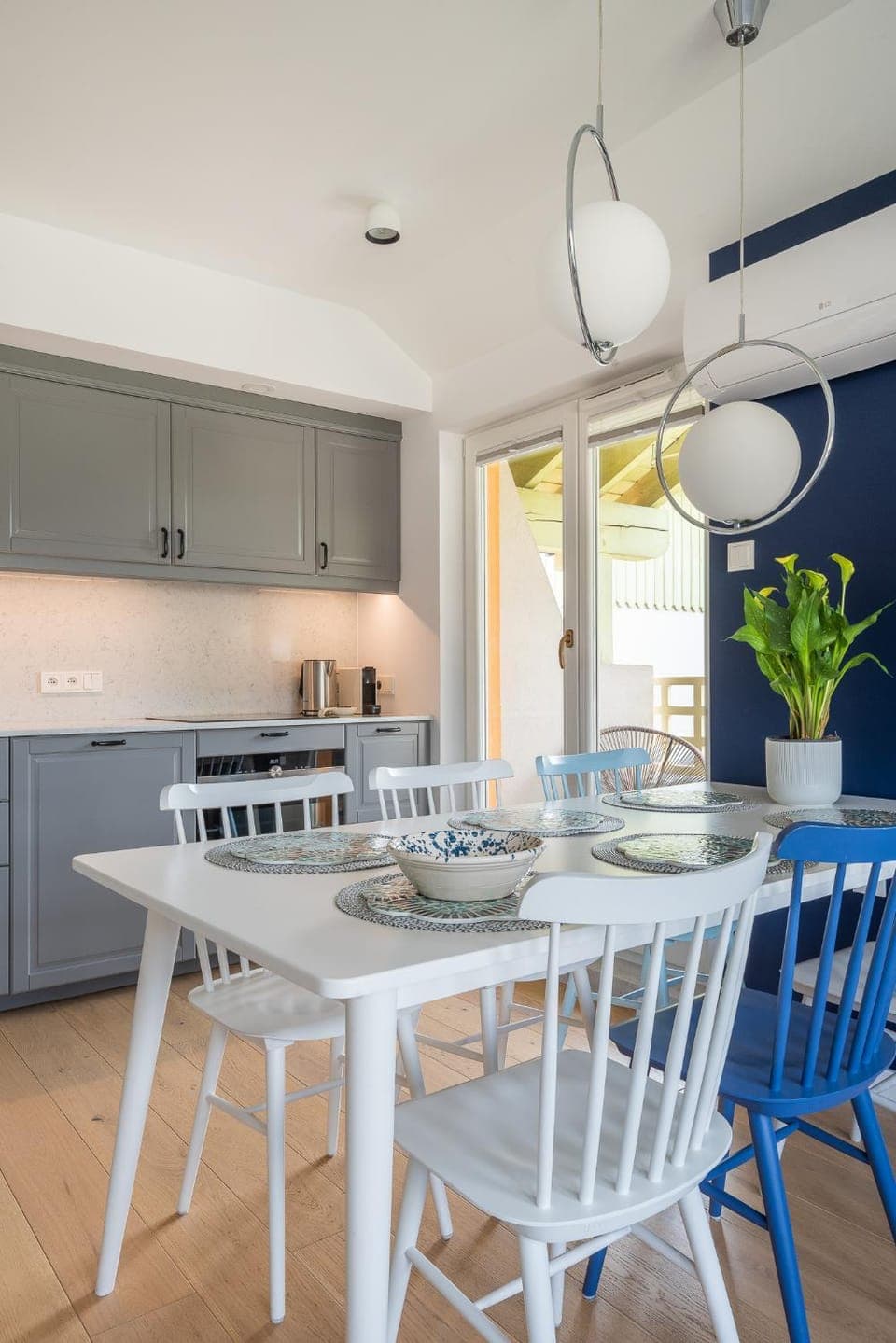 Kitchen or kitchenette, microwave, oven, stove, kitchen, air conditioner