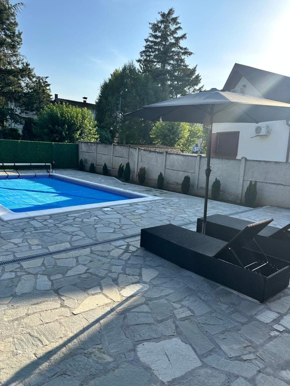 Swimming pool, sunbed