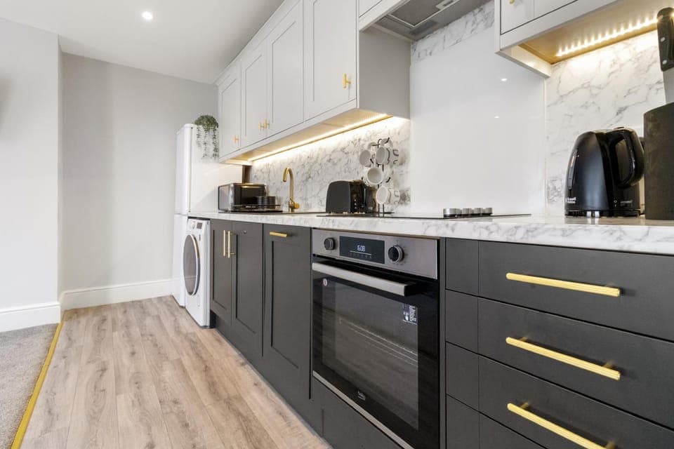 Kitchen or kitchenette, stove