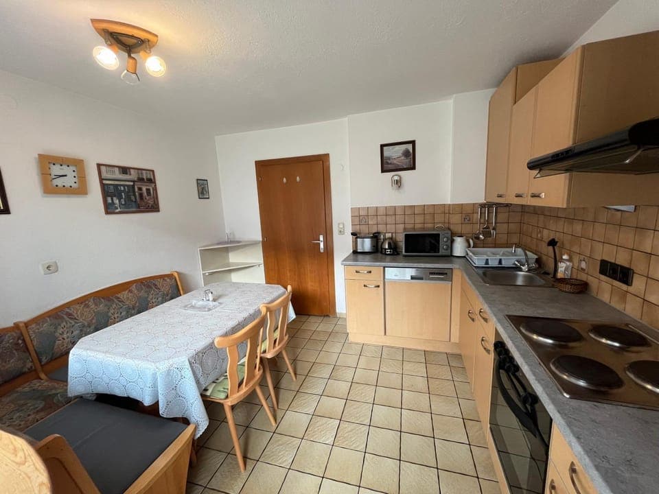 Kitchen or kitchenette, Dining area, dishwasher, stove, toaster