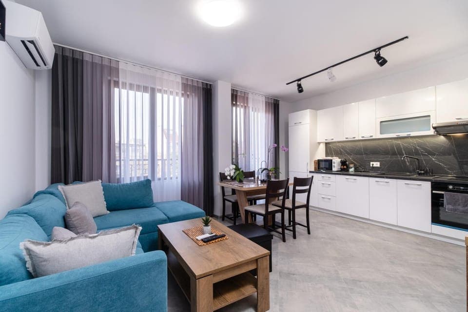 Kitchen or kitchenette, Living room, Seating area, Dining area