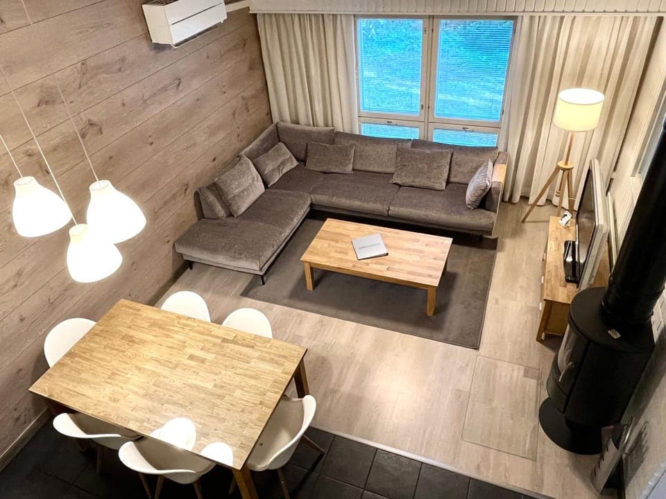 TV and multimedia, Living room, Photo of the whole room, Seating area, Dining area, fireplace, furniture, air conditioner