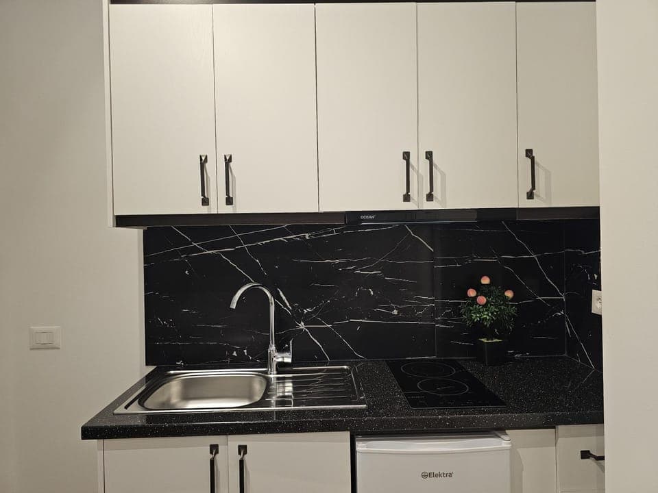 Kitchen or kitchenette, stove