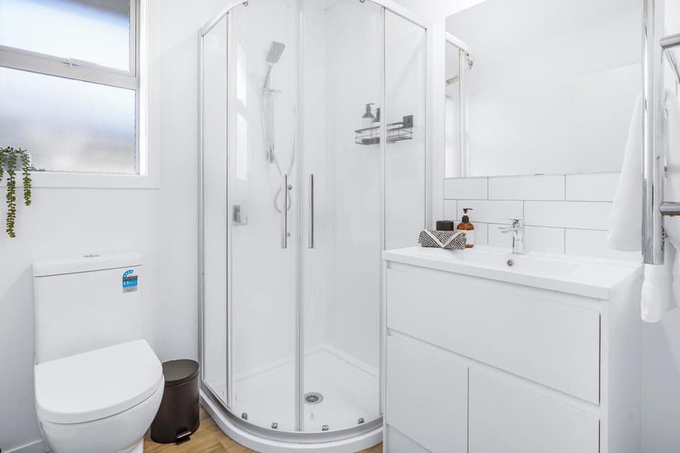 Shower, Toilet, Bathroom, hair dryier, towels