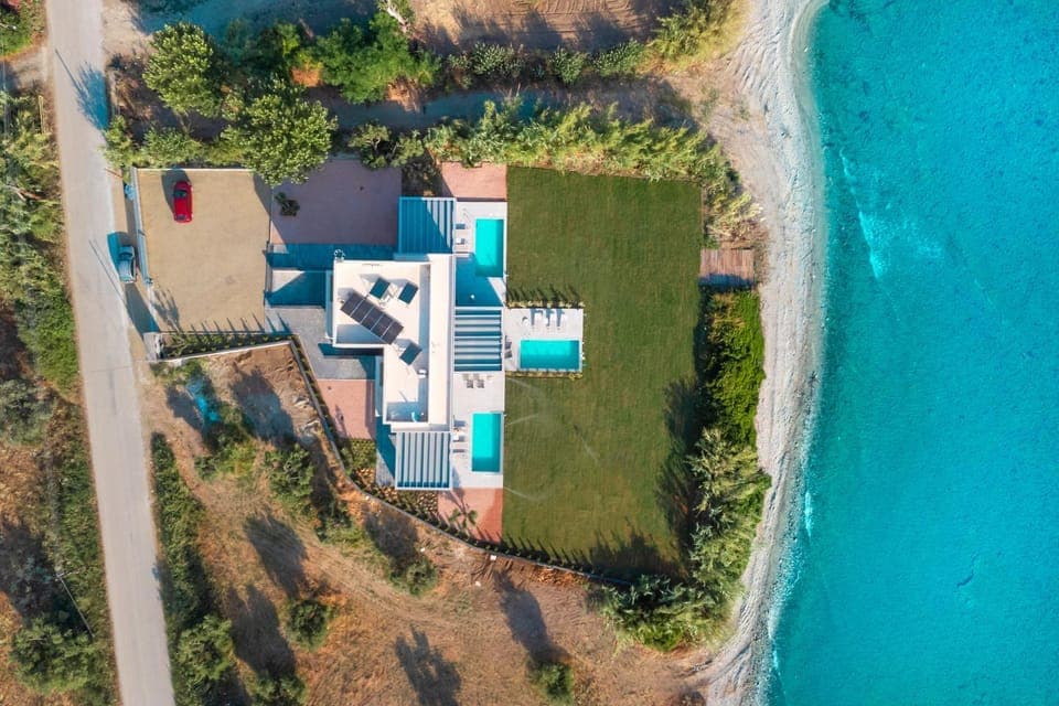 Property building, Bird's eye view, Beach, Swimming pool