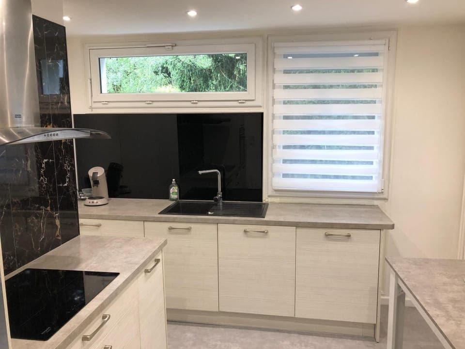 Kitchen or kitchenette, dishwasher, oven, stove