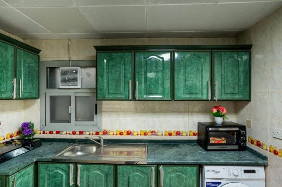 Kitchen or kitchenette, oven