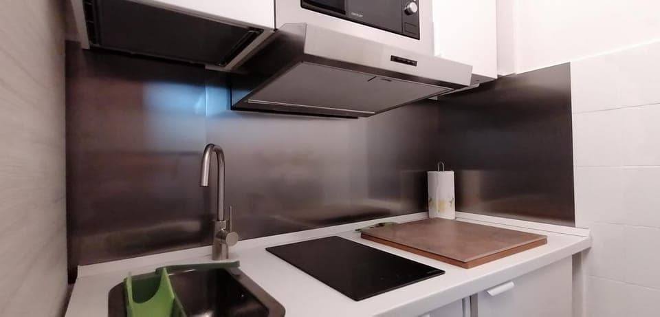 Kitchen or kitchenette, stove