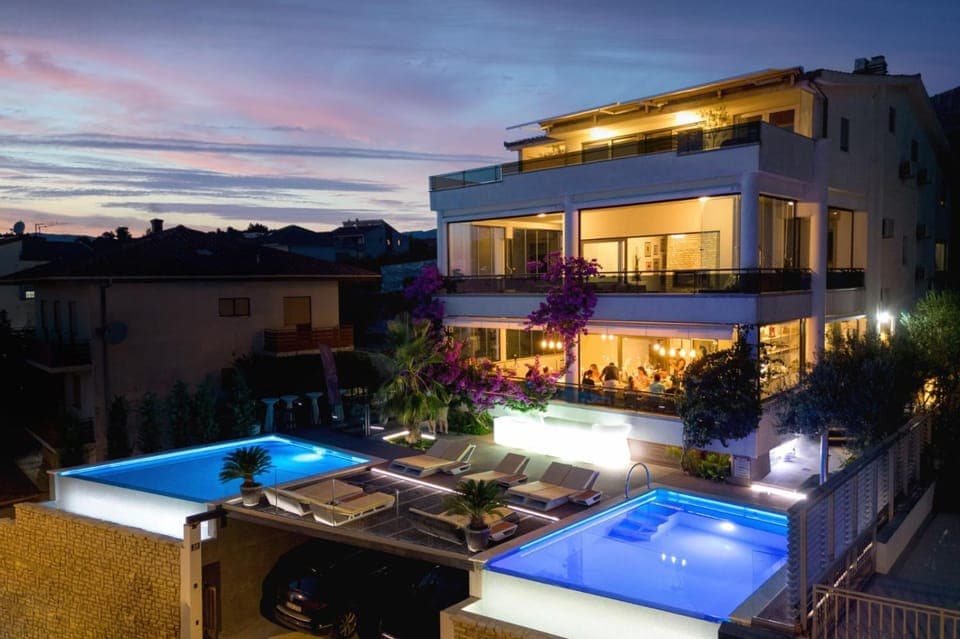 Patio, Night, Pool view, sunbed