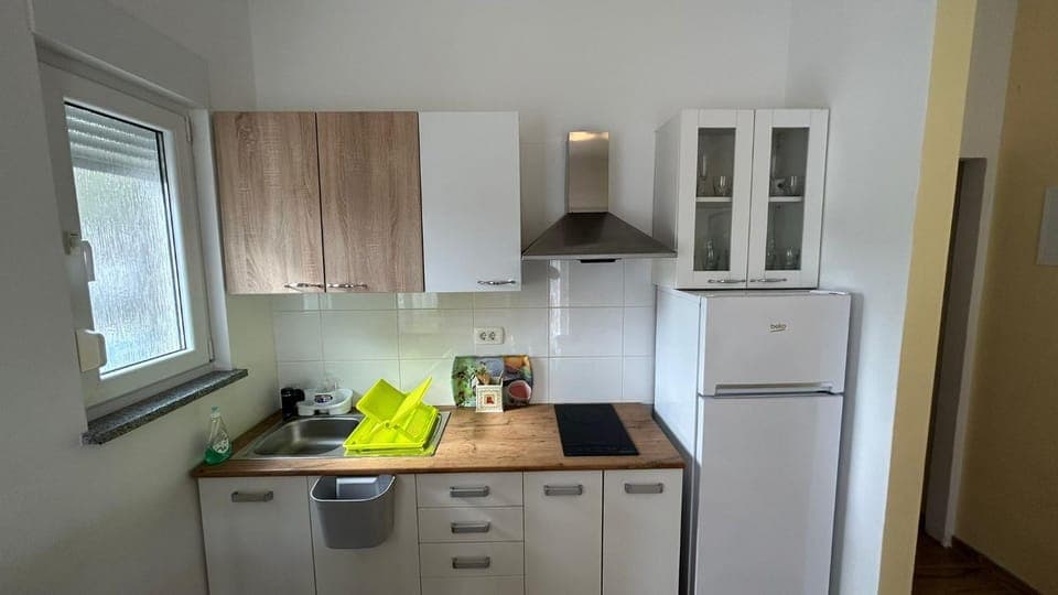 Kitchen or kitchenette, stove, toaster