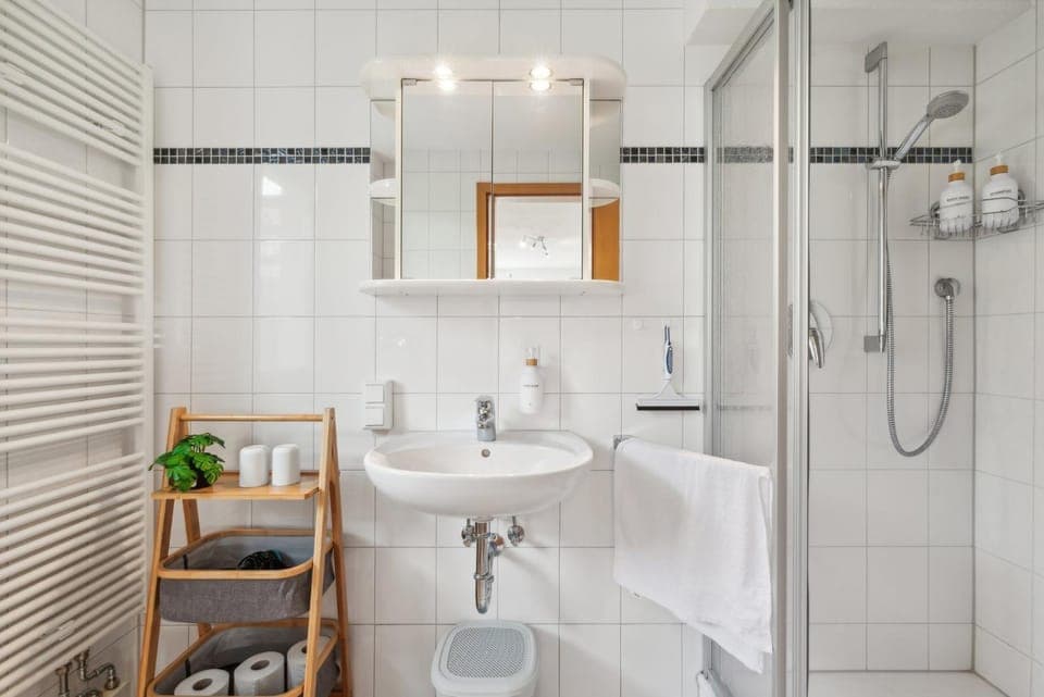 Shower, Toilet, Bathroom, hair dryier, towels