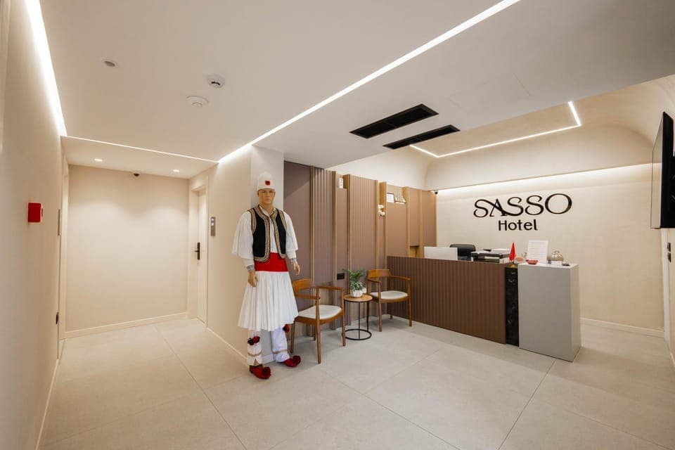 People, Property logo or sign, Lobby or reception, Text overlay