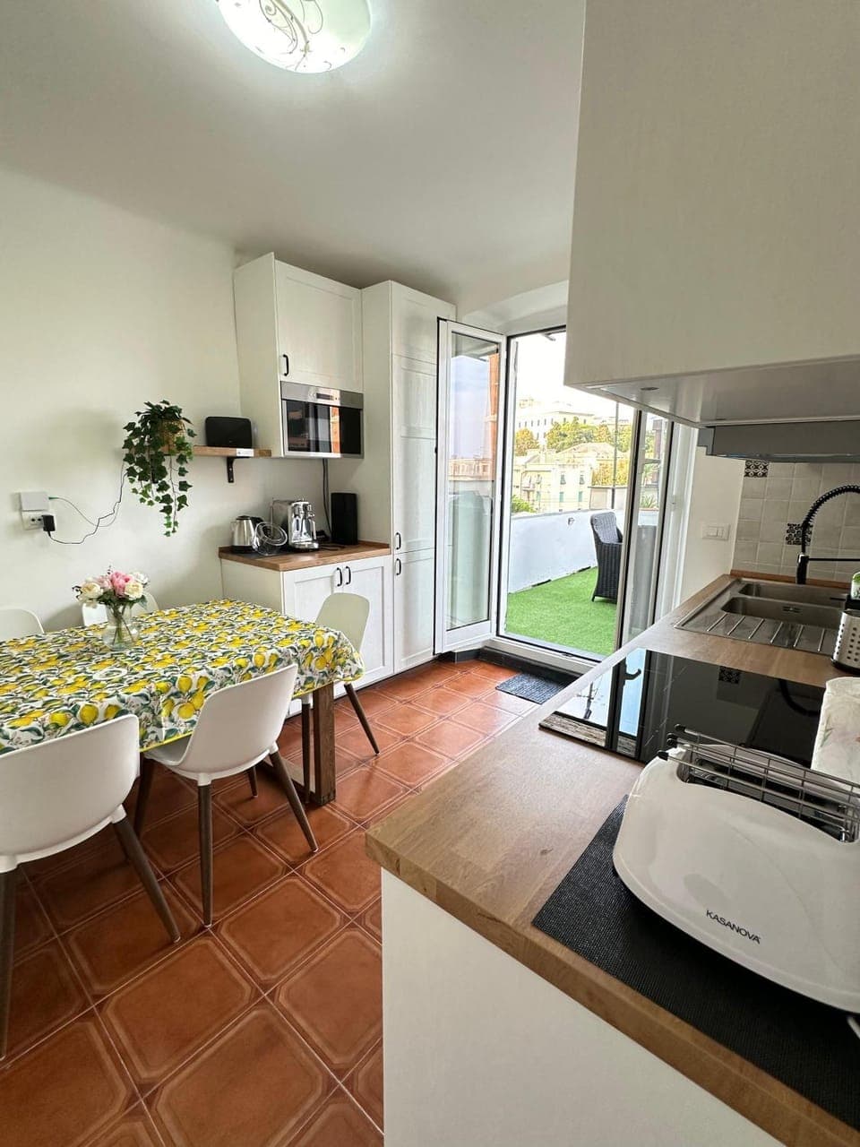 Kitchen or kitchenette, dishwasher, microwave, oven, stove