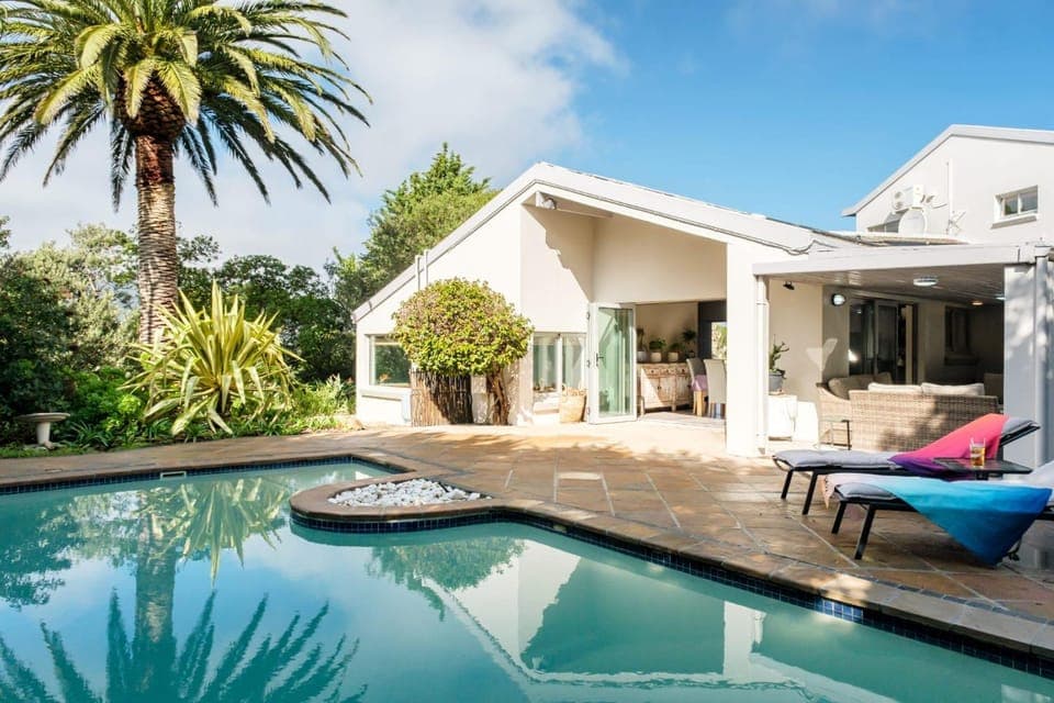 Property building, Patio, Garden, Seating area, Garden view, Swimming pool, sunbed